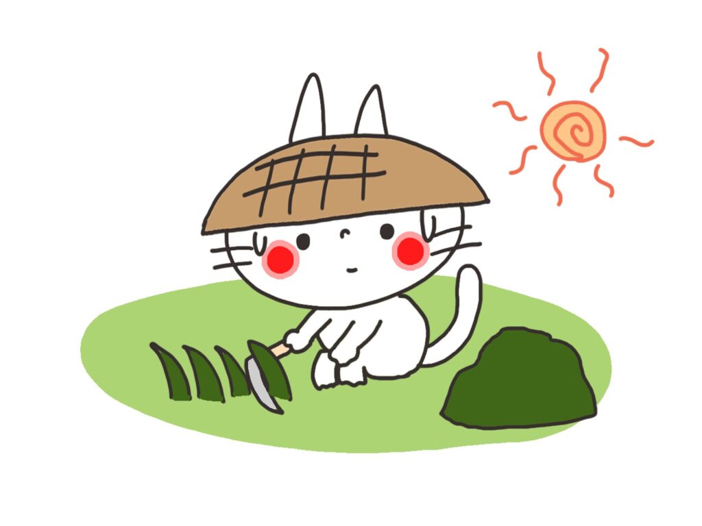 草刈りをするネコ