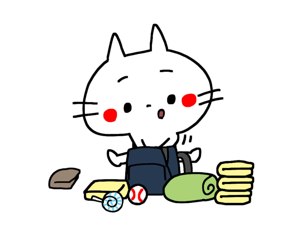 荷物を準備するネコ